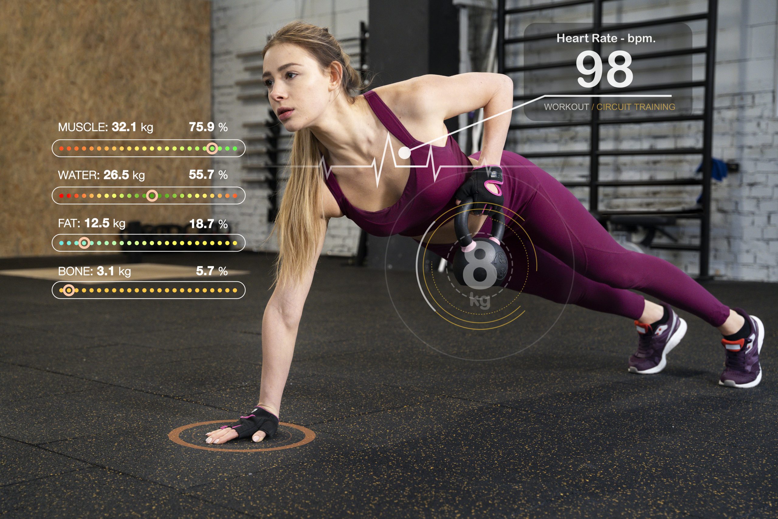 Woman performing plank kettlebell exercise indoors